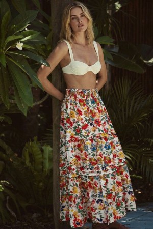 UT7043 / LIME N CHILI<br/>TIERED MAXI SKIRT WITH MULTICOLORED FLORAL PRINT AND SMOCKED WAISTBAND.