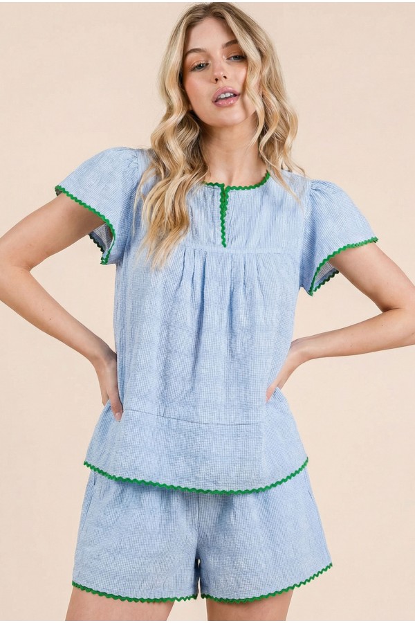 UT7060SET / LIME N CHILI<br/>Two-piece set with light blue textured top and matching shorts, finished with green trim accents